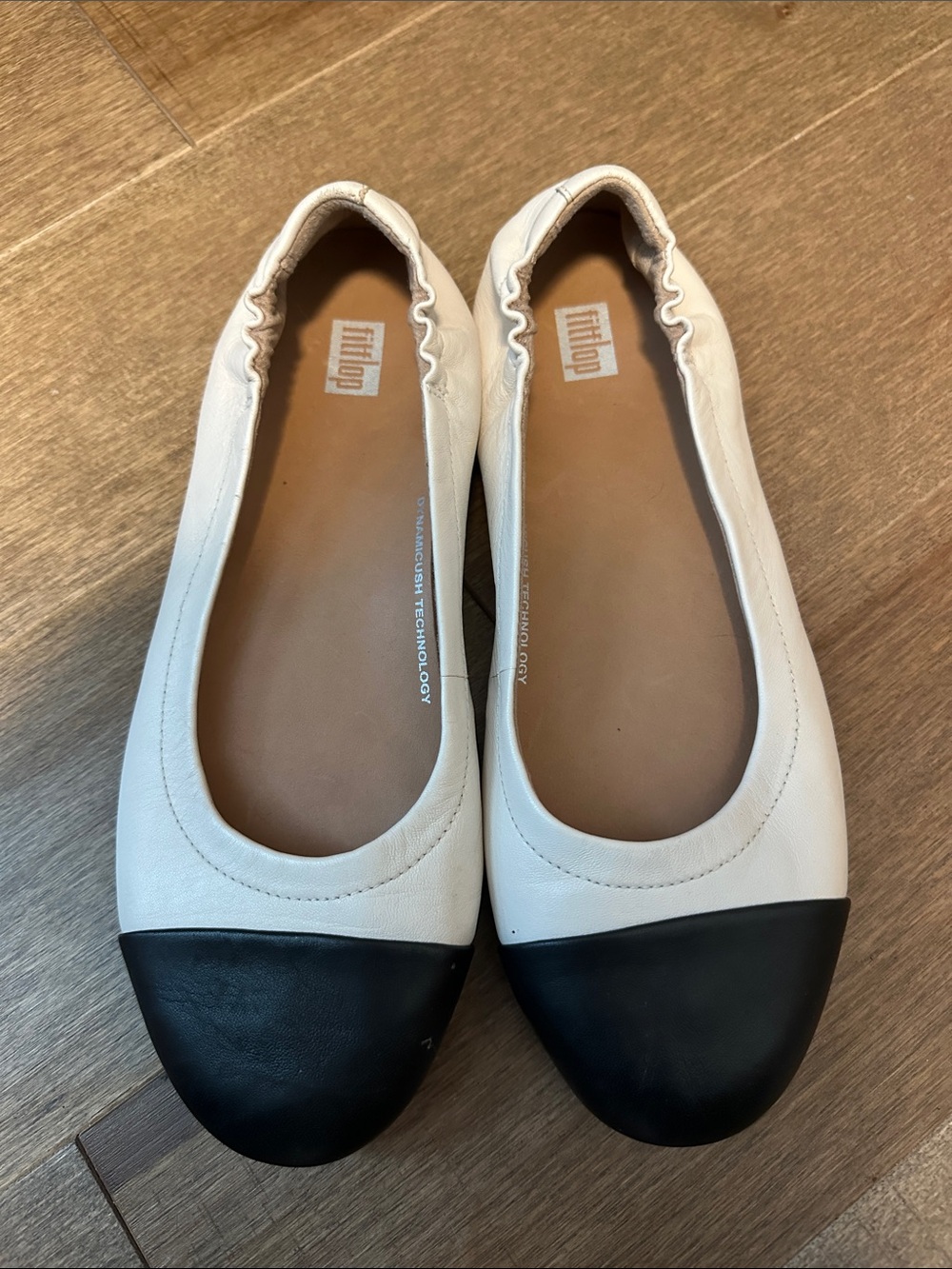 Fitflop Women's White Ballet Flats with Black Cap Toe